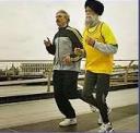 Fauja Singh practicing with his coach.  Photo: BBC